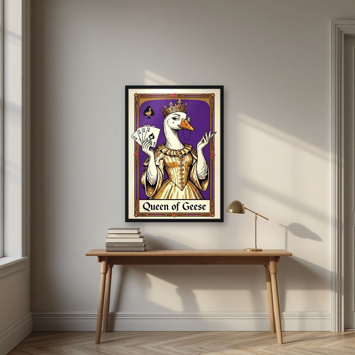 Queen of Geese – Violet Velvet art print, in a black frame, styled in a desk