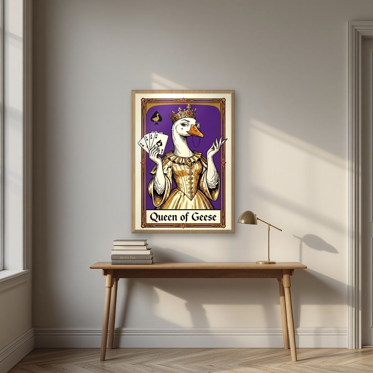 Queen of Geese – Violet Velvet art print, in an oak frame, styled in a desk