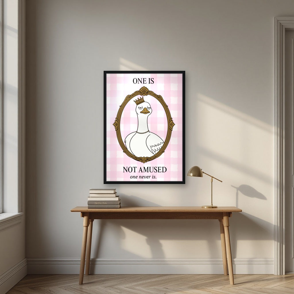 One Is Not Amused – Gingham Rose art print, in a black frame, styled in a desk