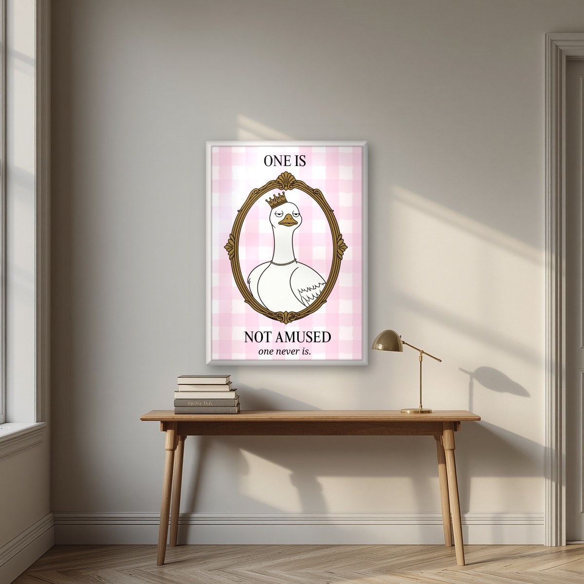 One Is Not Amused – Gingham Rose art print, in a white frame, styled in a desk