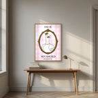 One Is Not Amused – Gingham Rose art print, in an oak frame, styled in a desk