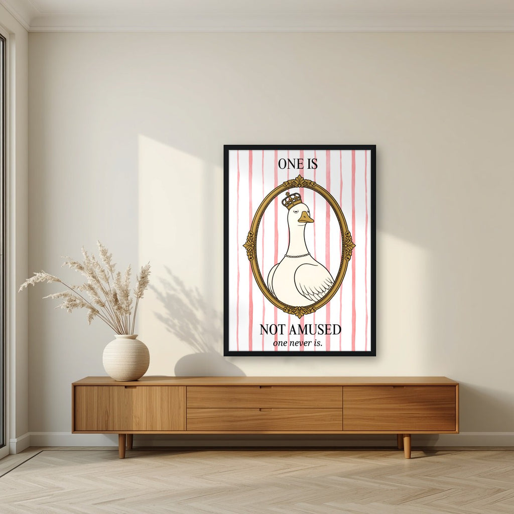 One Is Not Amused – Rosewater Stripe art print, in a black frame, styled in a living room