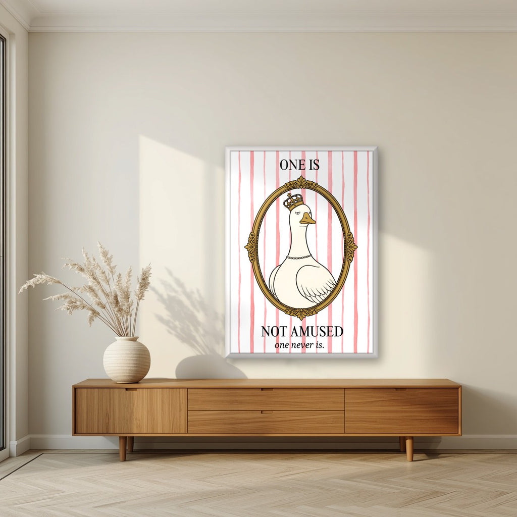 One Is Not Amused – Rosewater Stripe art print, in a white frame, styled in a living room