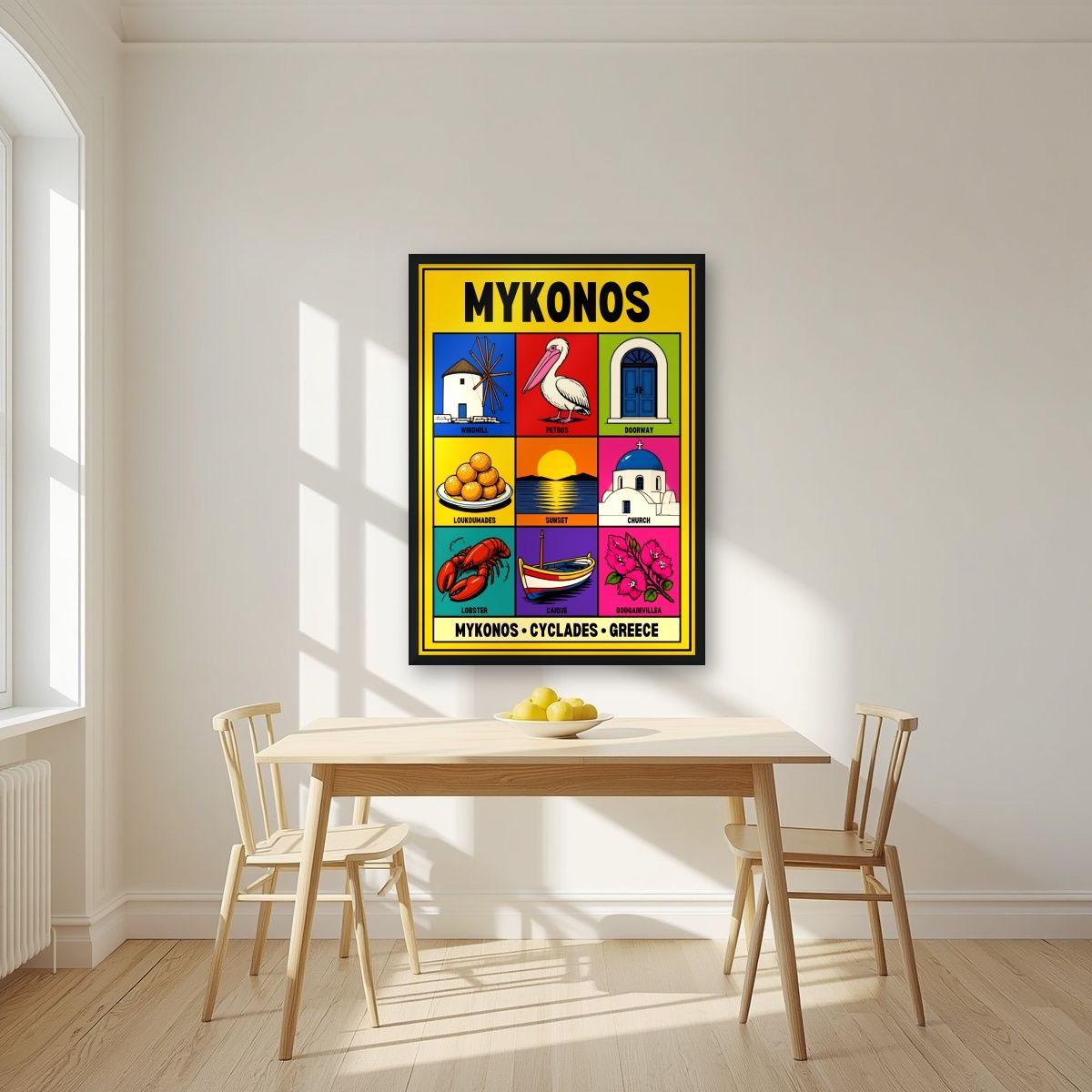 Island Almanac — Mykonos art print, in a black frame, styled in a kitchen