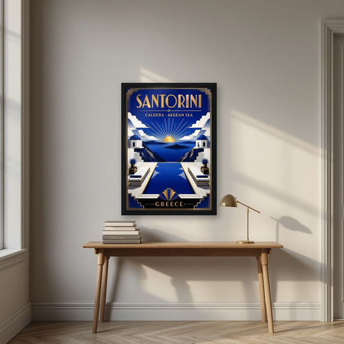 Deco Caldera — Santorini art print, in a black frame, styled in a desk