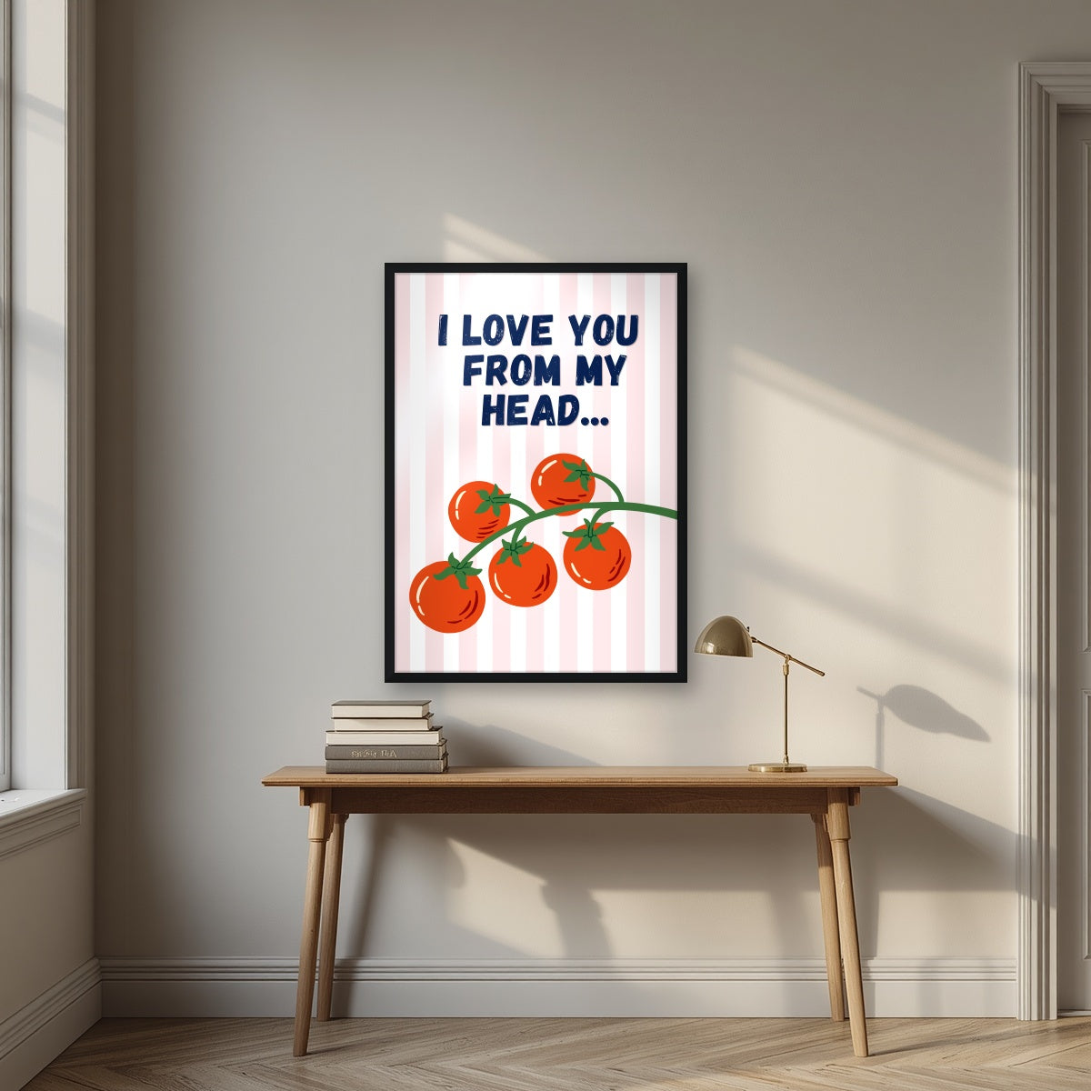 Head To-Matoes – Blossom Stripe print in a black frame above a desk