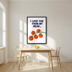 Head To-Matoes – Blossom Stripe print in a black frame in a kitchen
