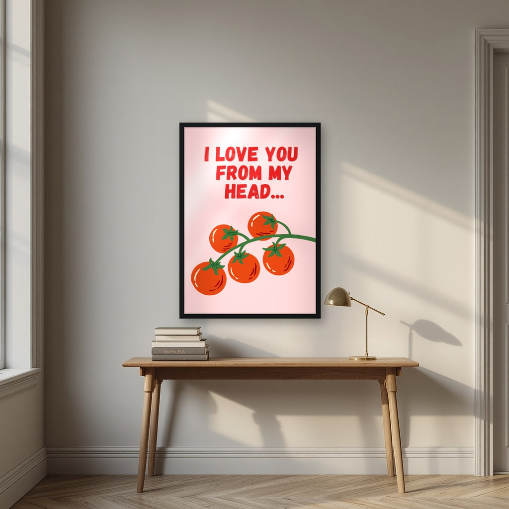Head To-Matoes – Powder Blush print in a black frame above a desk