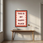 This Is My Happy Place – Coral art print, in a black frame, styled in a desk