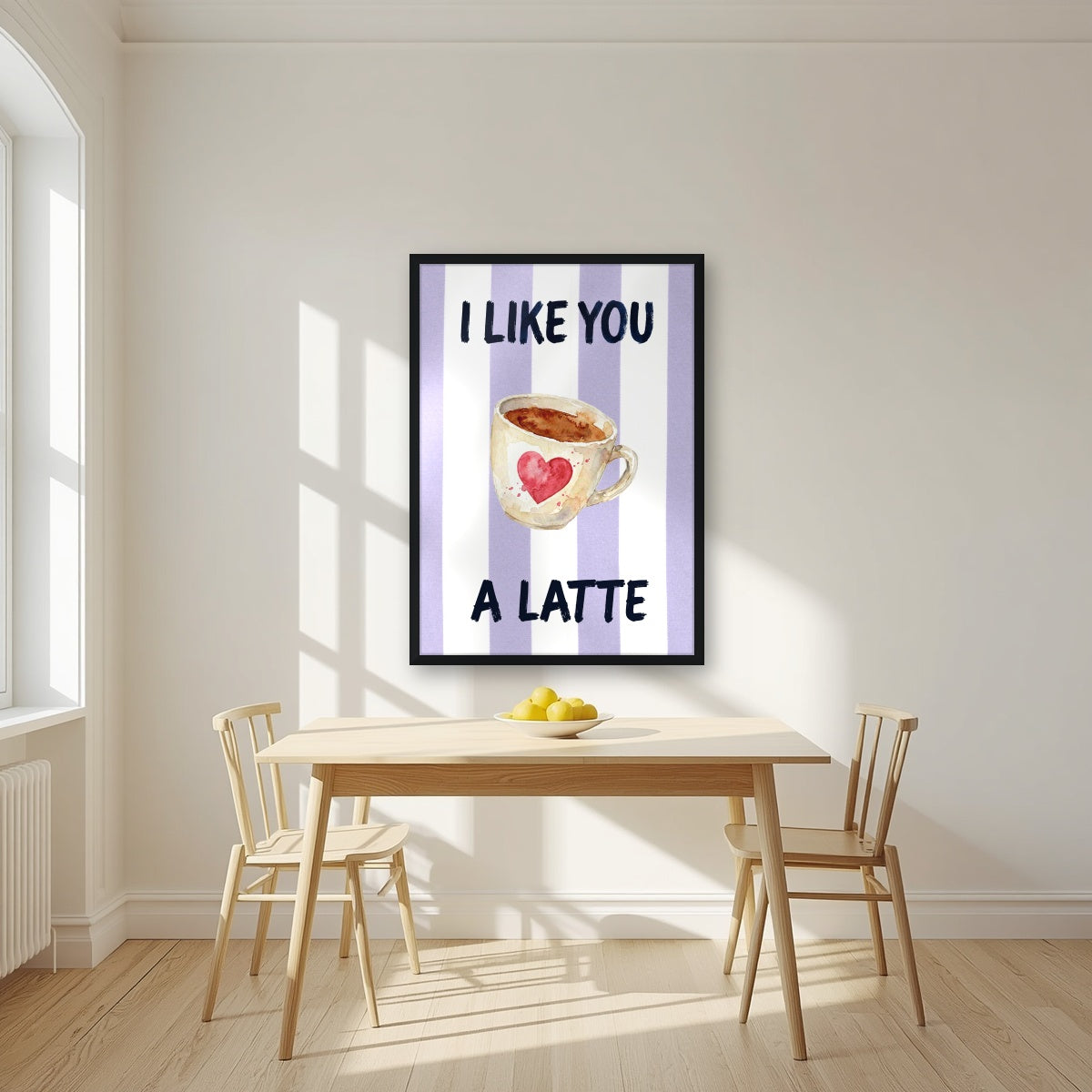 I Like You a Latte – Capri Violet in a black frame, above a dining table in a bright kitchen