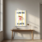 I Like You a Latte – Limoncello in a white frame, above an oak writing desk