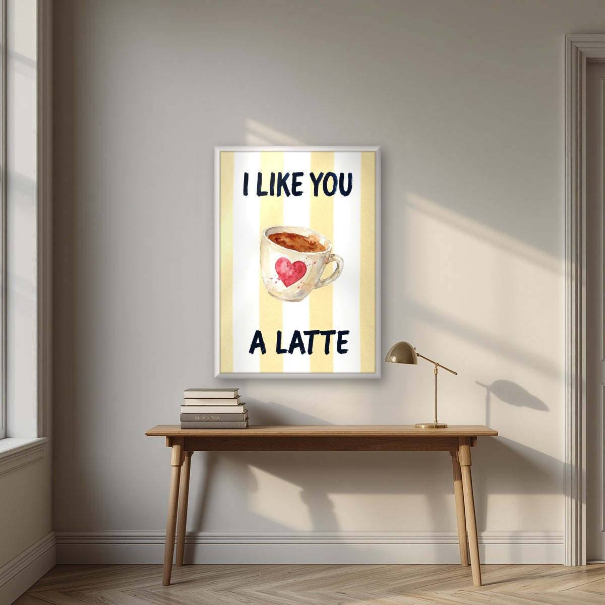 I Like You a Latte – Limoncello in a white frame, above an oak writing desk