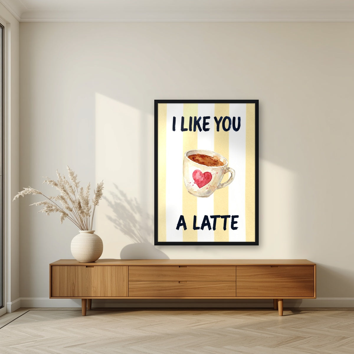 I Like You a Latte – Limoncello in a black frame, above a walnut sideboard in a living room