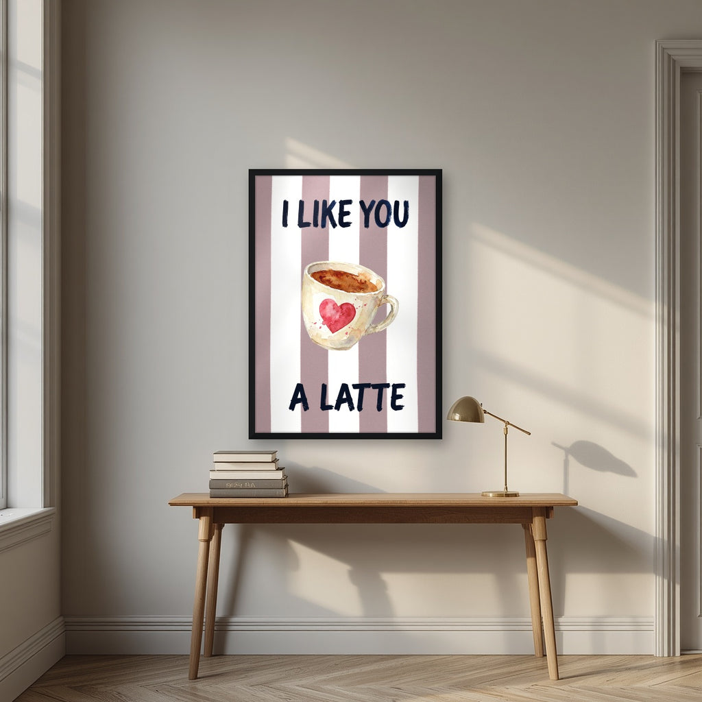 I Like You a Latte – Tuscan Taupe in a black frame, above an oak writing desk