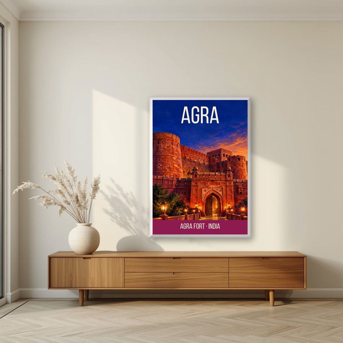 Agra Fort art print in a white frame on a living room wall