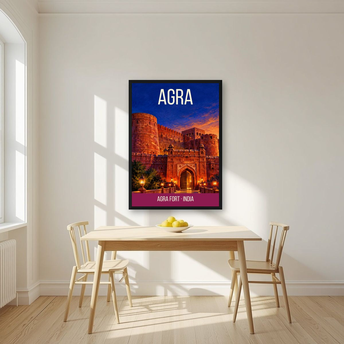 Agra Fort art print in a black frame on a kitchen wall