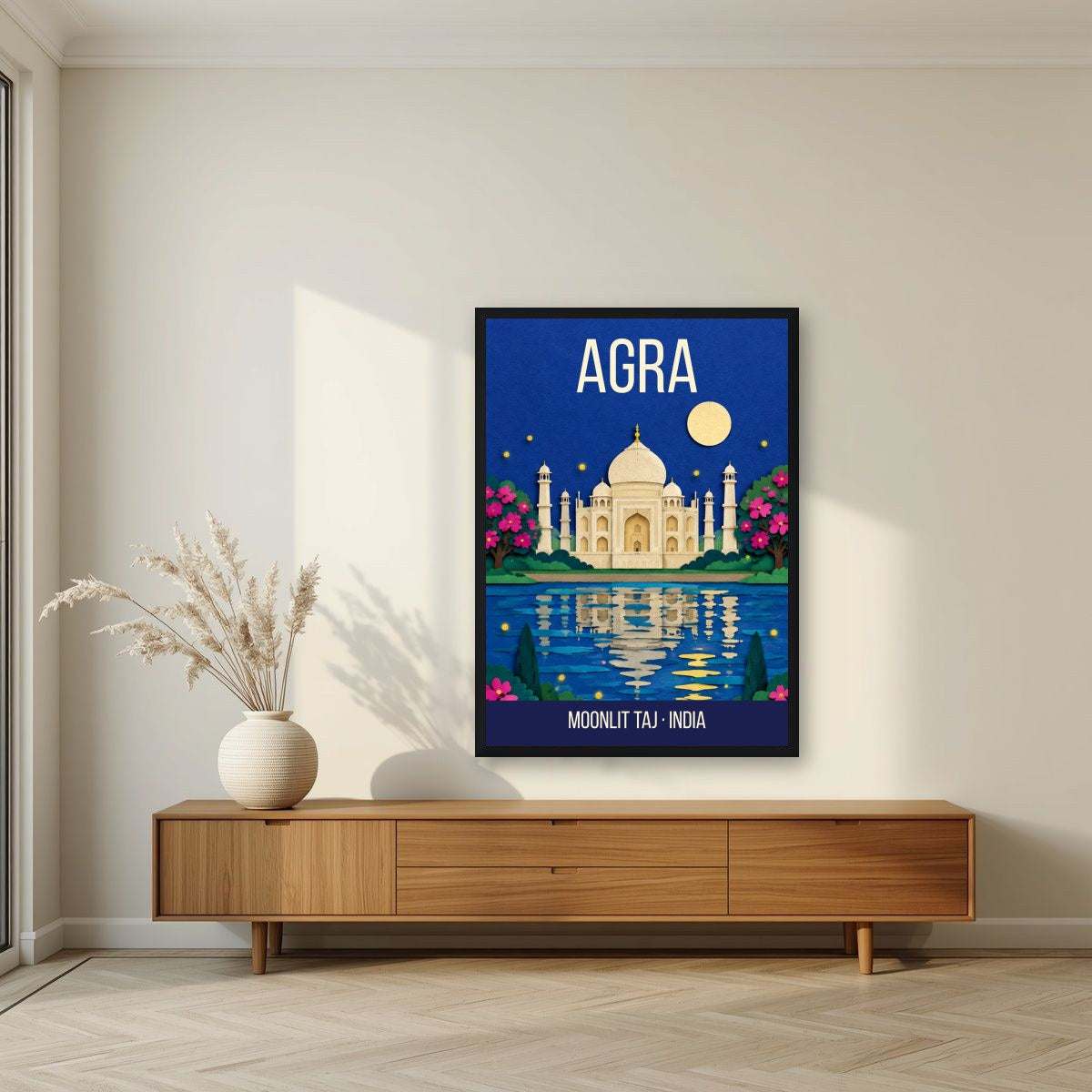 Moonlit Taj Agra art print in a black frame above a living room sideboard