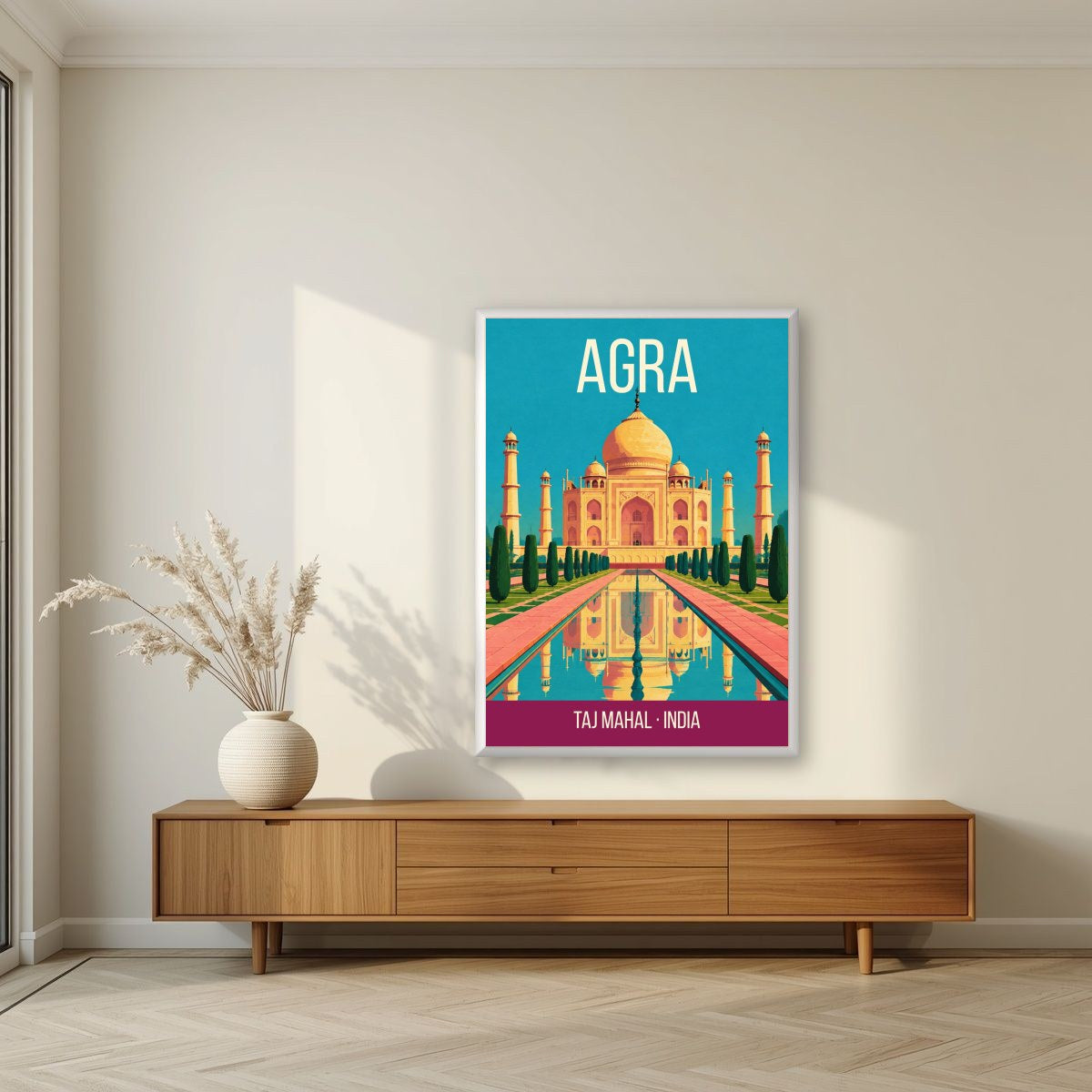 Taj Mahal Agra art print in a white frame on a living room wall