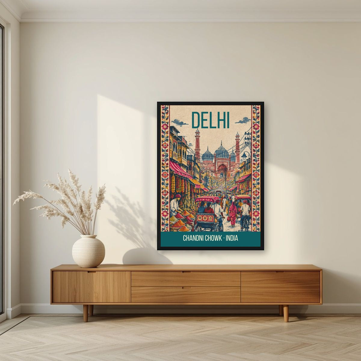 Chandni Chowk Delhi art print in a black frame above a living room sideboard