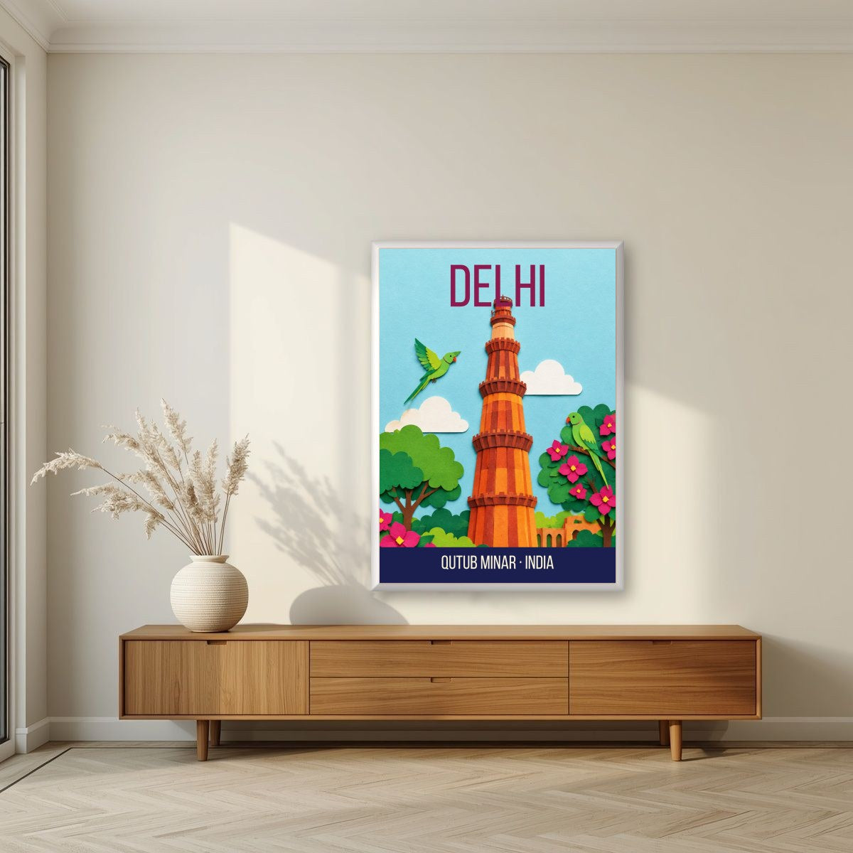 Qutub Minar Delhi art print in a white frame on a living room wall