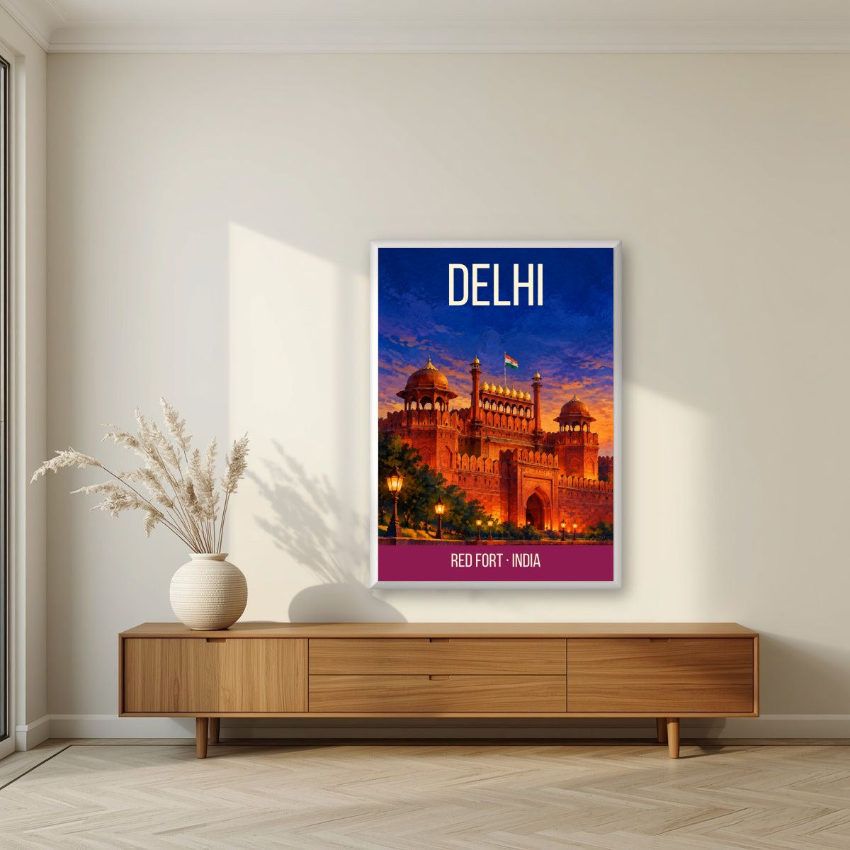 Red Fort Delhi art print in a white frame on a living room wall
