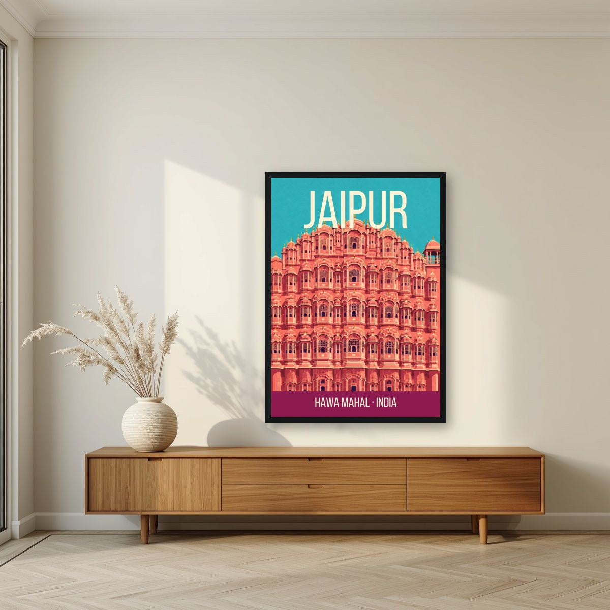 Hawa Mahal Jaipur art print in a black frame above a living room sideboard