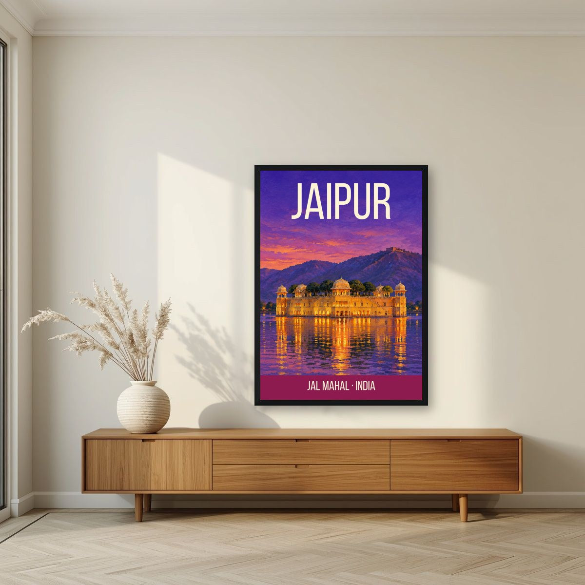 Jal Mahal Jaipur art print in a black frame above a living room sideboard