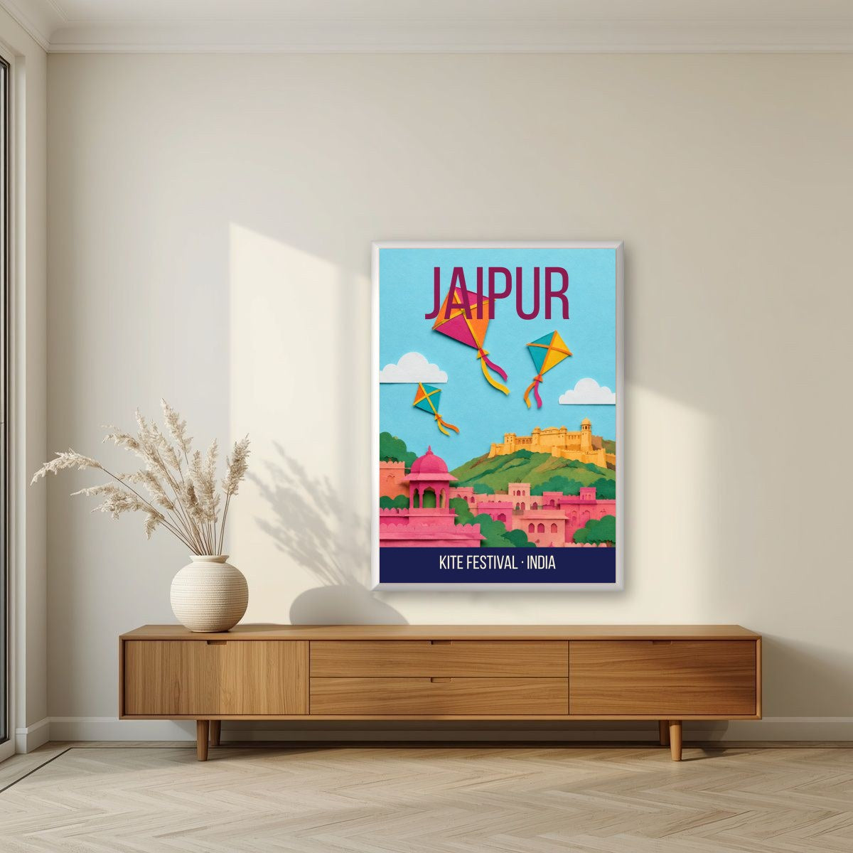 Kite Festival Jaipur art print in a white frame on a living room wall