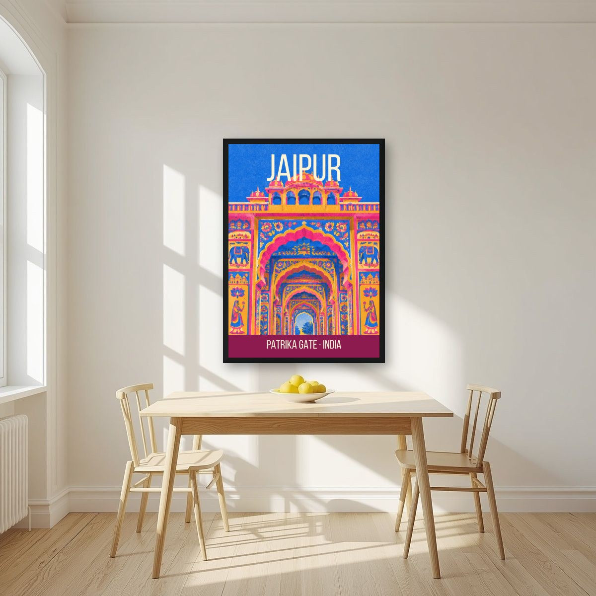 Patrika Gate Jaipur art print in a black frame on a kitchen wall