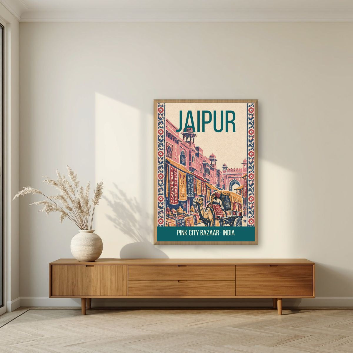 Pink City Bazaar Jaipur art print in an oak frame on a living room wall
