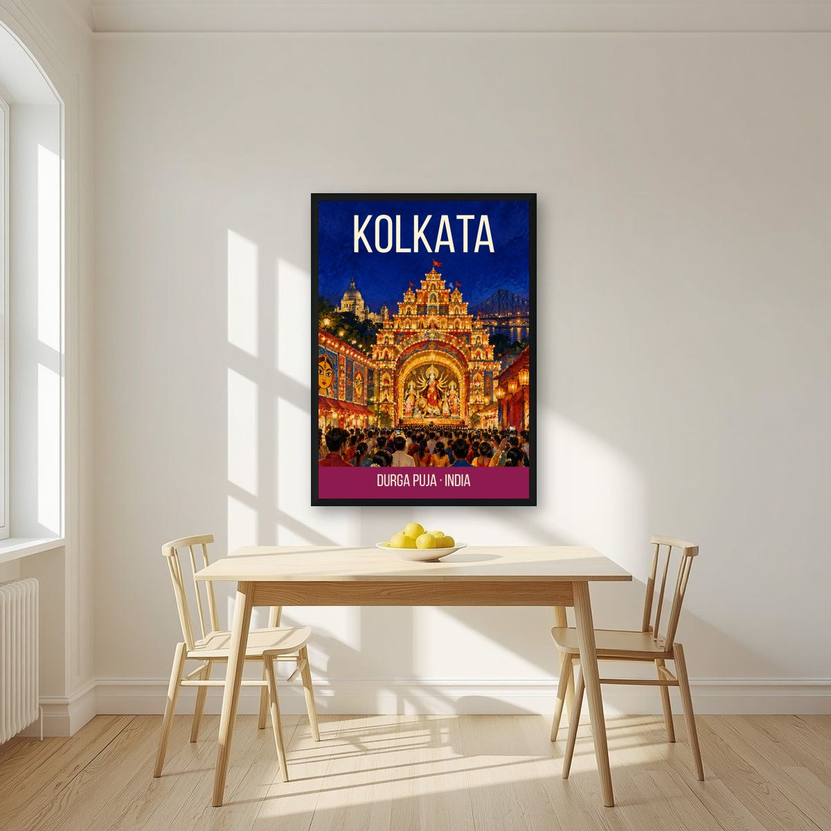 Durga Puja Kolkata art print in a black frame on a kitchen wall