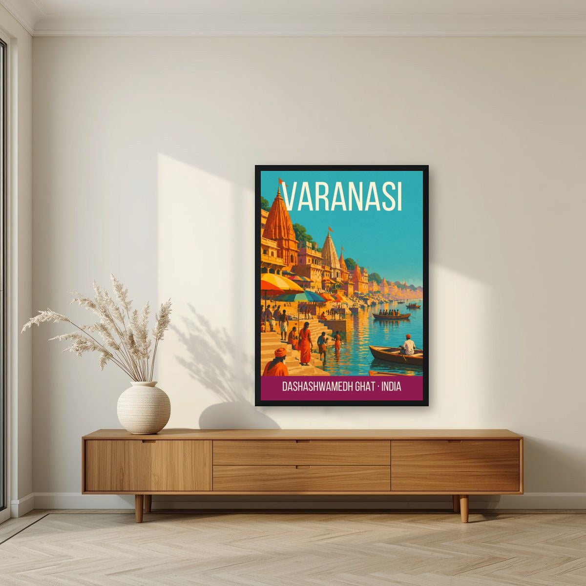 Dashashwamedh Ghat Varanasi art print in a black frame above a living room sideboard