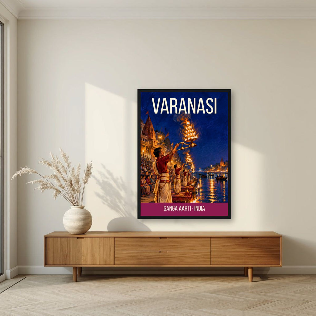 Ganga Aarti Varanasi art print in a black frame above a living room sideboard