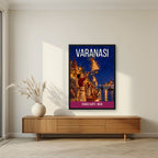 Ganga Aarti Varanasi art print in a black frame above a living room sideboard