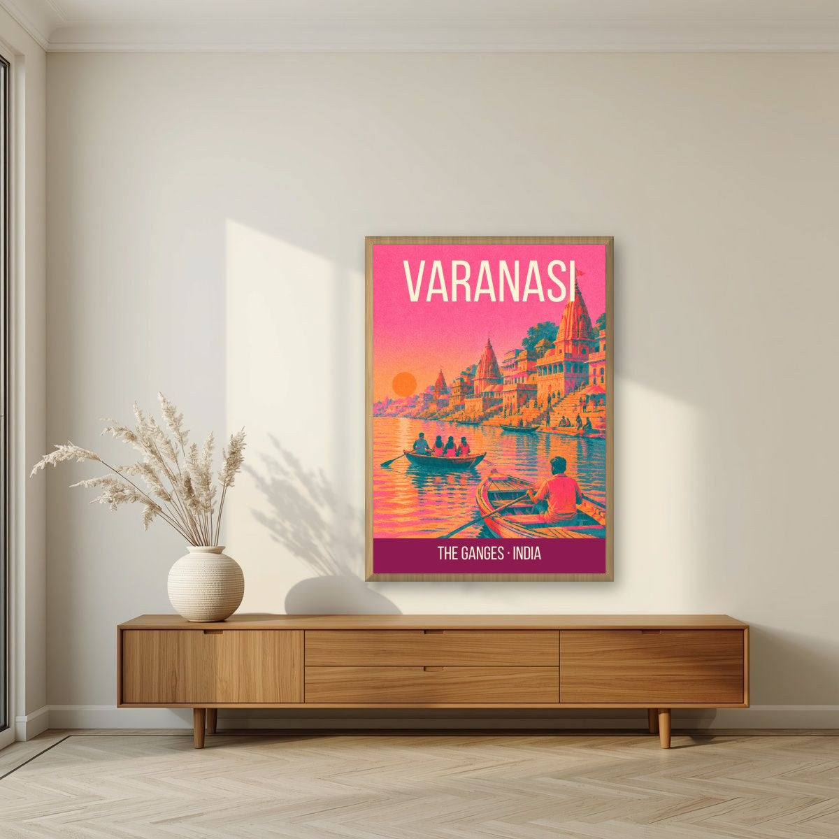 The Ganges Varanasi art print in an oak frame on a living room wall