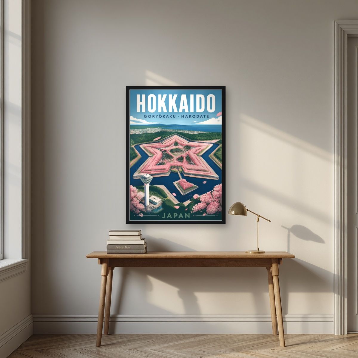 Goryokaku Hoshi — Japan Cherry Blossom Season art print, in a black frame, styled in a desk