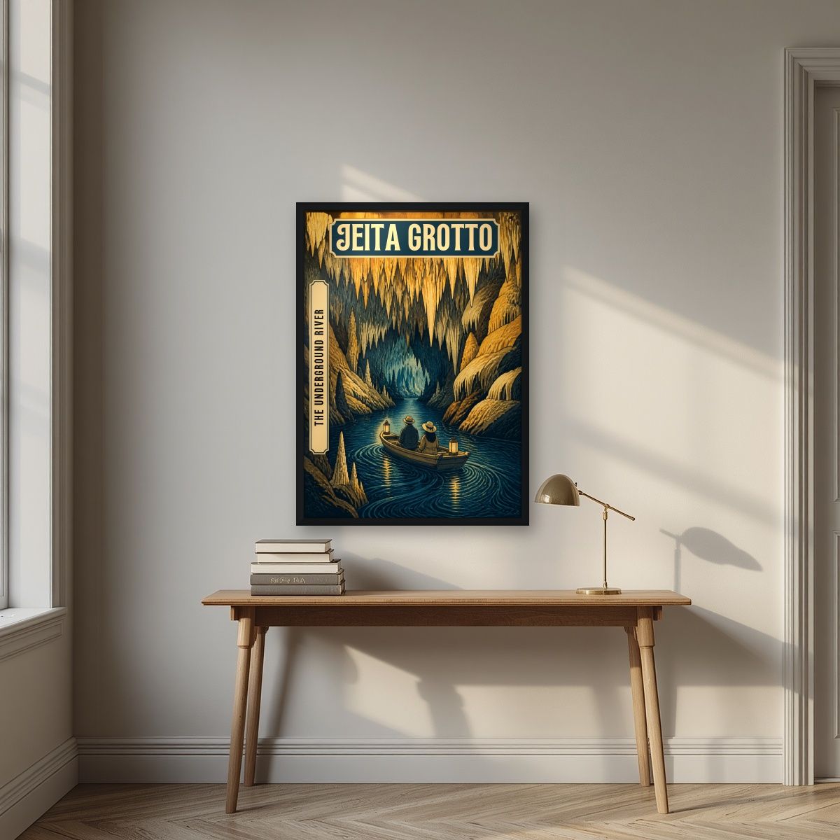 The Underground River — Jeita Grotto art print, in a black frame, styled in a desk
