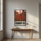 Strawberry Field — Liverpool art print, in a black frame, styled in a desk