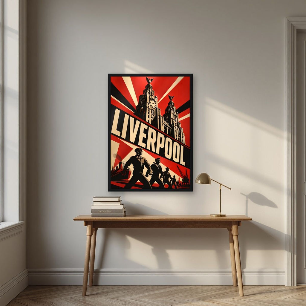 The Liver Birds — Liverpool art print, in a black frame, styled in a desk