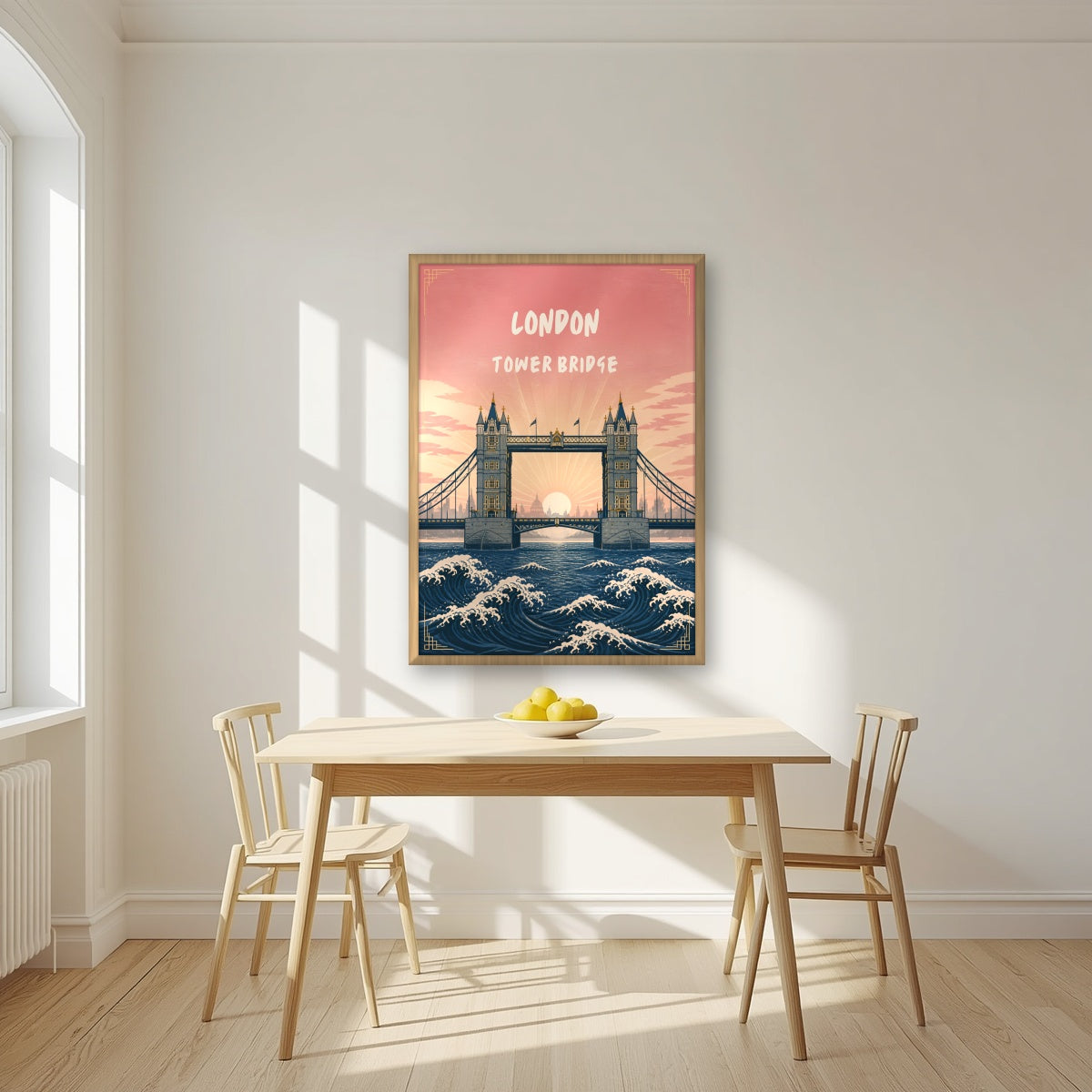 Tower Bridge London art print in an oak frame, above a dining table in a bright kitchen