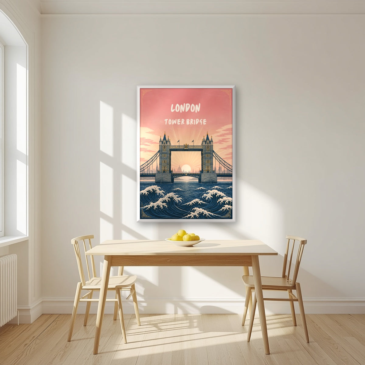 Tower Bridge London art print in a white frame, above a dining table in a bright kitchen