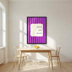 Love You More – Capri Violet print in a black frame in a kitchen