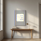 Love You More – Cornflower Stripe on slim canvas above a desk