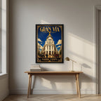Gran Vía — Madrid art print, in a black frame, styled in a desk