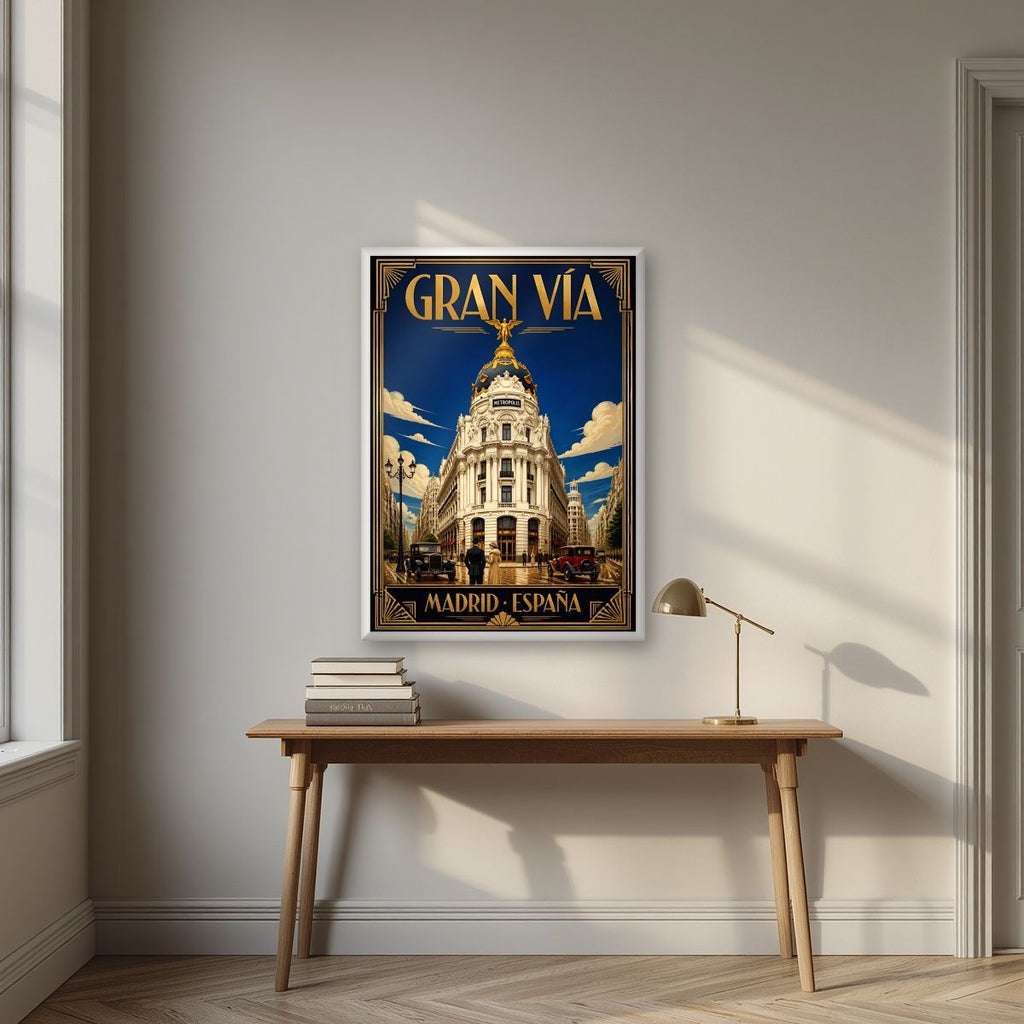 Gran Vía — Madrid art print, in a white frame, styled in a desk