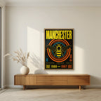 Madchester Manchester art print in an oak frame, above a walnut sideboard in a living room