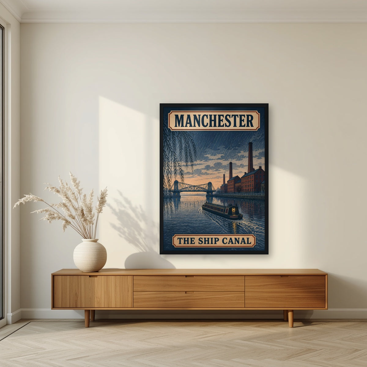 The Ship Canal Manchester art print in a black frame, above a walnut sideboard in a living room