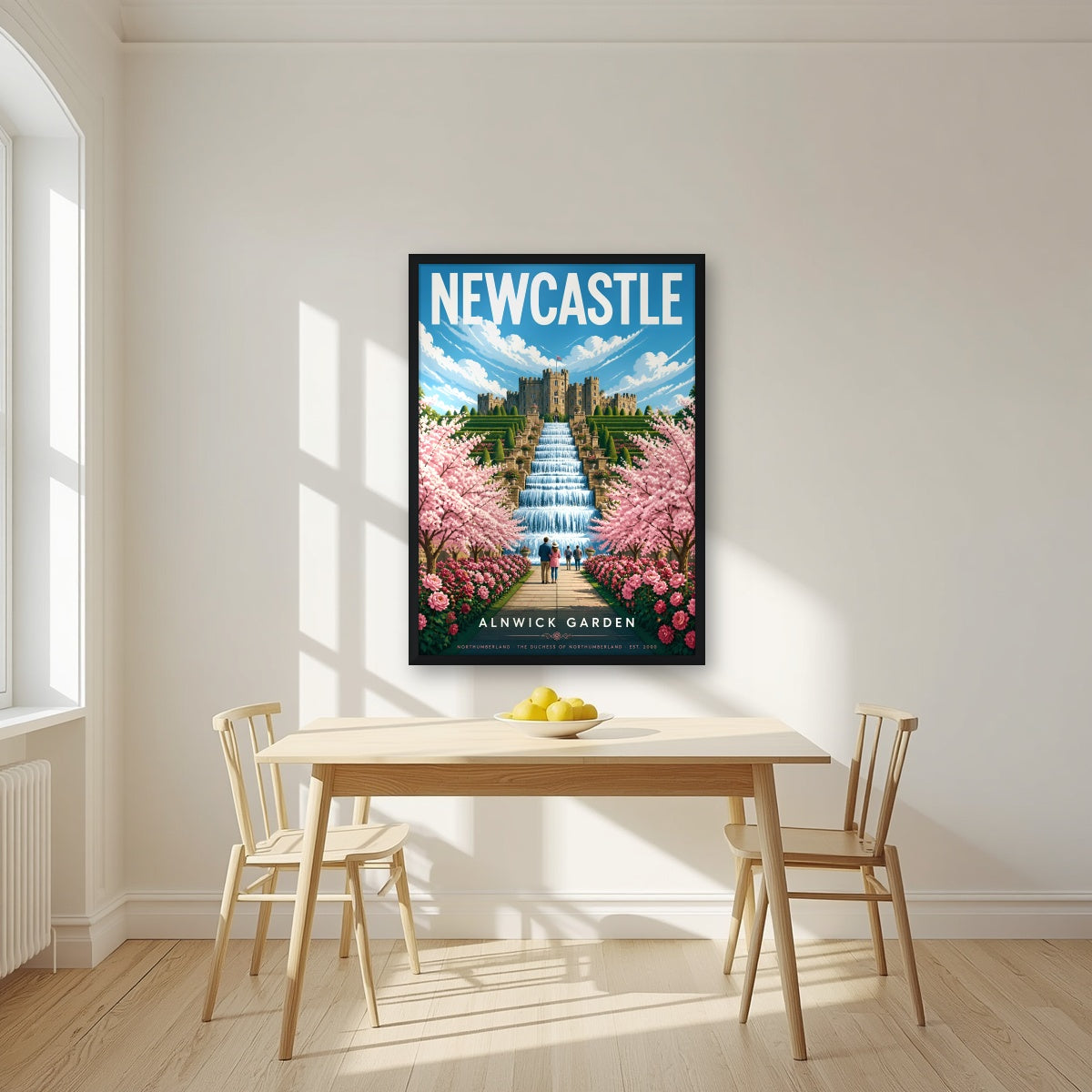 Alnwick Garden Newcastle art print in a black frame, above a dining table in a bright kitchen
