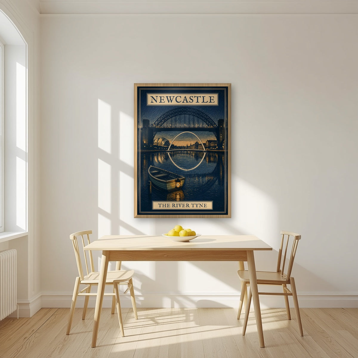 The River Tyne Newcastle art print in an oak frame, above a dining table in a bright kitchen