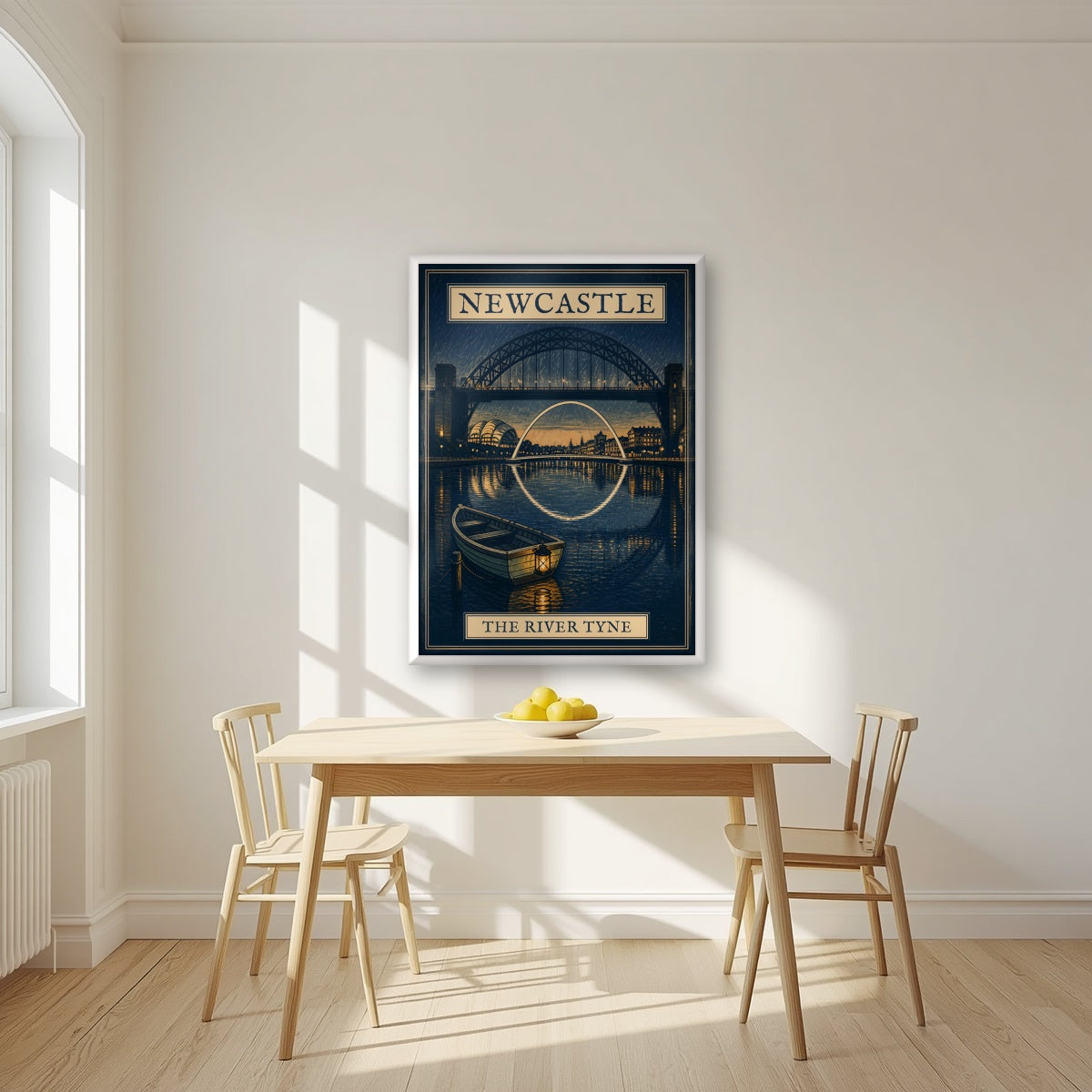 The River Tyne Newcastle art print in a white frame, above a dining table in a bright kitchen